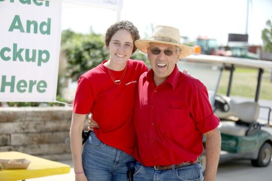 Grandpa Tanner with a Tanners Orchard employee