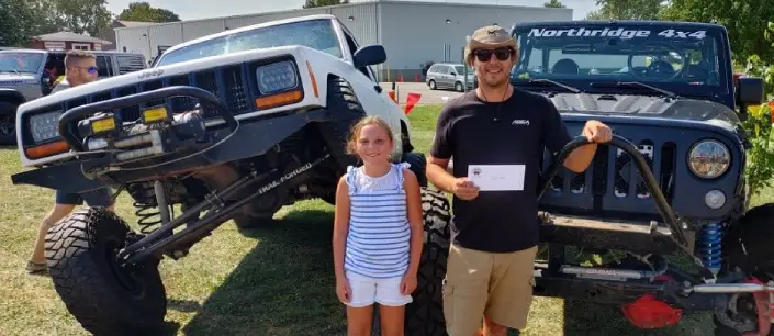 Two impressively upgraded Jeeps at the Jeep Show at Tanners Orchard