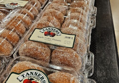 Boxed up apple cider donuts in the Apple Bin Bakery at Tanners Orchard