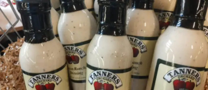 A basket full of unique sauces, found at the Farm Market at Tanners Orchard